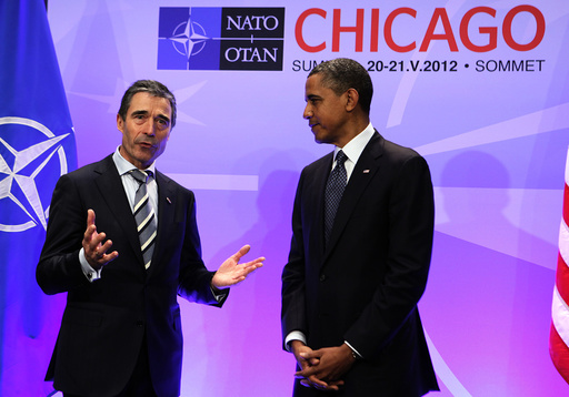 U.S. President Barack Obama listens to NATO Secretary General Rasmussen in Chicago
