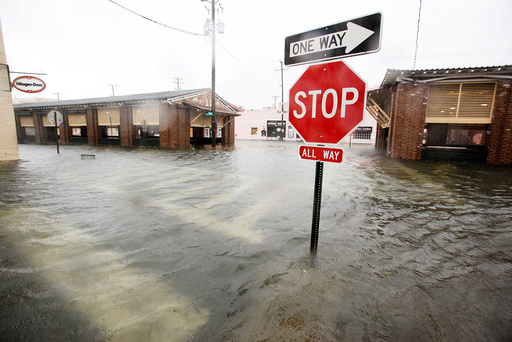 Flood waters submerge the historic city market area as Hurricane Matthew hits Charleston, South Carolina