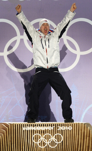 Gold medallist Svendsen celebrates during the medals ceremony for the men's 20 kilometres individual biathlon at the Vancouver 2010 Winter Olympics