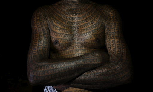 The Wider Image: Tattoos, faith and caste in India
