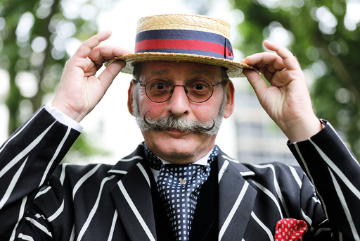 A participant poses for a photograph during the Chap Olympiad in Bedford Square, London