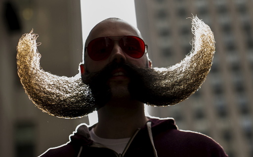 MJ Johnson gathers with other contestants to promote the National Beard and Moustache Championships in New York