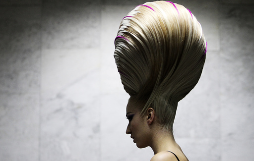 A model waits backstage before the Alternative Hair Show in Moscows Kremlin