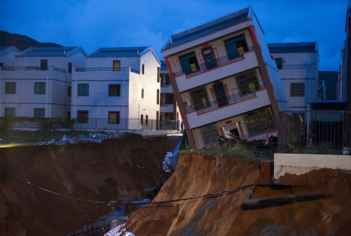 Damaged house is seen after a heavy rainfall caused by Typhoon Vamco hit Lingshui Ethnic Li Autonomous County, in Hainan