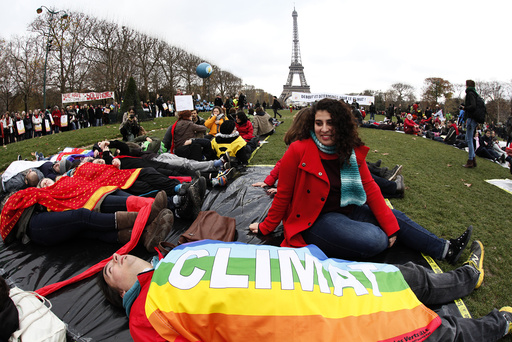near the Eiffel Tower in Paris as the World Climate Change Conference 2015 (COP21) continues near the French capital in Le Bourget
