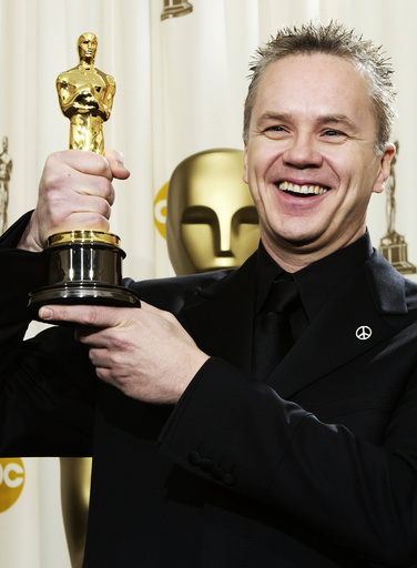 TIM ROBBINS HOLDS UP BEST SUPPORTING ACTOR OSCAR