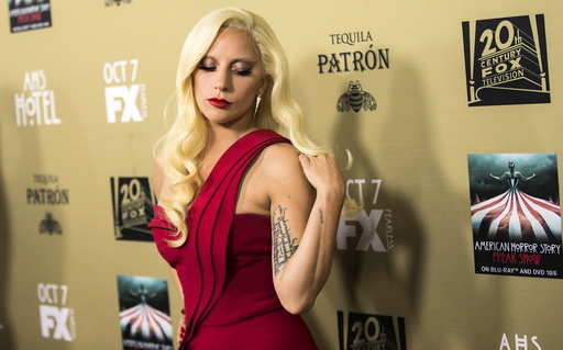 Cast member Lady Gaga poses at a premiere screening of 