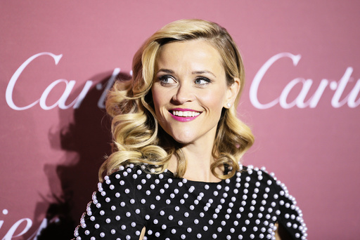 Actress Reese Witherspoon, who is receiving the Chairman's Award, poses at the 26th Annual Palm Springs International Film Festival Awards Gala in Palm Springs