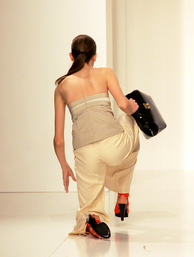 Model falls down during the fashion show trademark Forum, summer collection during the Sao Paulo Fashion Week