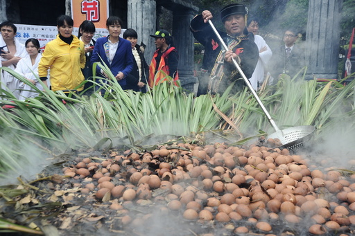 More than a thousand eggs are boiled with spices in a pot during a 