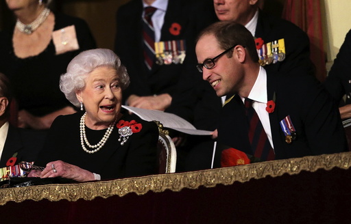Britain's Queen Elizabeth and Prince William, Duke of Cambridge, chat with each other in the Royal Box at the Royal Albert Hall during the Annual Festival of Remembrance in London