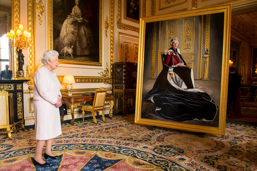 Britain's Queen Elizabeth views a portrait of herself by British artist Henry Ward, commissioned to mark her six decades of patronage to the British Red Cross, at Windsor Castle