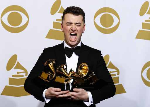 Sam Smith poses with his awards during the 57th annual Grammy Awards in Los Angeles