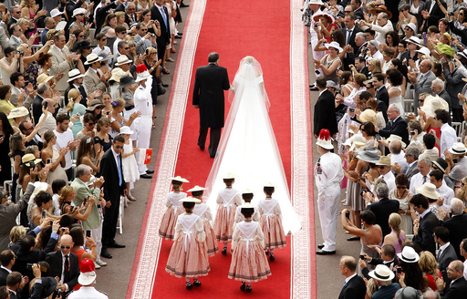 Michael Kenneth Wittstock escorts his daughter Princess Charlene on the red carpet at the Place du Palais for the religious wedding ceremony with Prince Albert II at the Palace in Monaco
