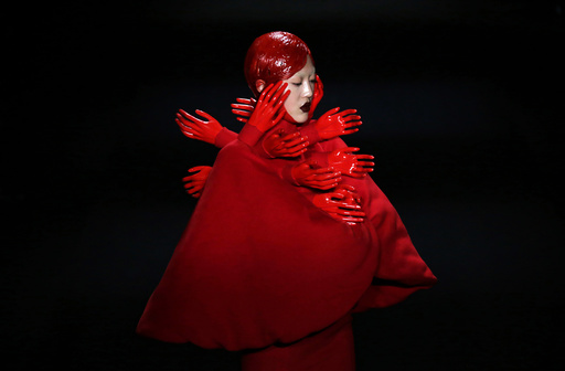 A model presents a creation by Chinese designer Hu Sheguang at China Fashion Week in Beijing