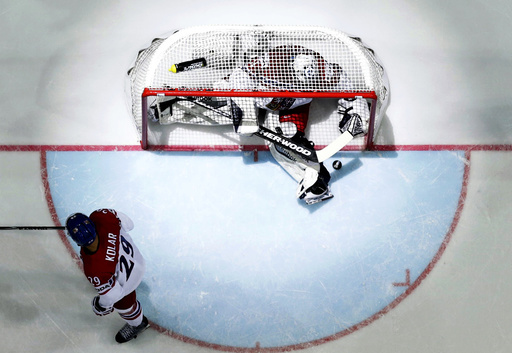 Goaltender Pavelec of the Czech Republic reacts after a goal during the Ice Hockey World Championship game against Canada at the O2 arena in Prague