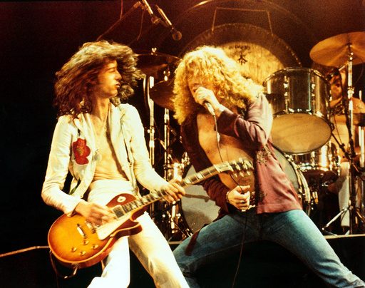 THE SONG REMAINS THE SAME, Led Zeppelin members Jimmy Page and Robert Plant, 1976