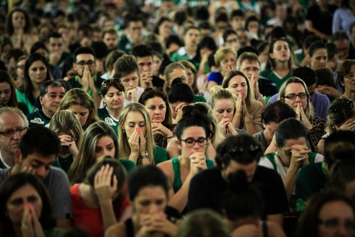 Chapecoense fans attend a mass for victims of plane crash