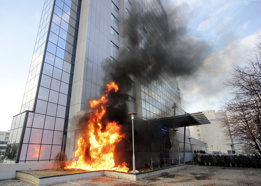Kosovo government building is set on fire by protesters during clashes in Pristina