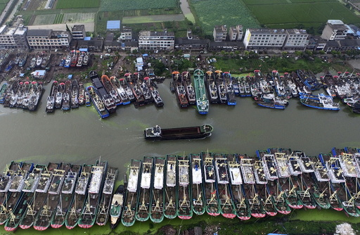 An aerial view shows boats being anchored in a bay as Typhoon Chan-Hom approaches Taizhou