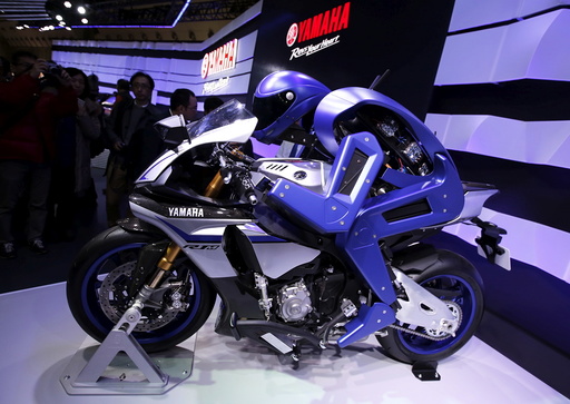 Yamaha Motor Co Ltd's displays the company's prototype model of a motorcycle riding robot 'MOTOBOT Ver. 1' at the 44th Tokyo Motor Show in Tokyo, Japan