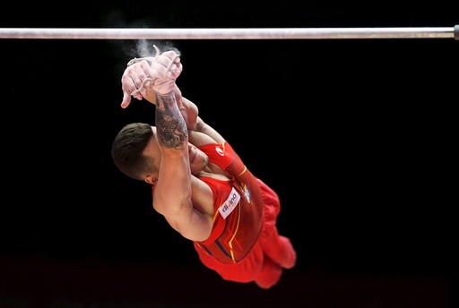 Nestor Abad of Spain falls from the High Bar during the men's qualification for the World Gymnastics Championships at the Hydro arena in Glasgow