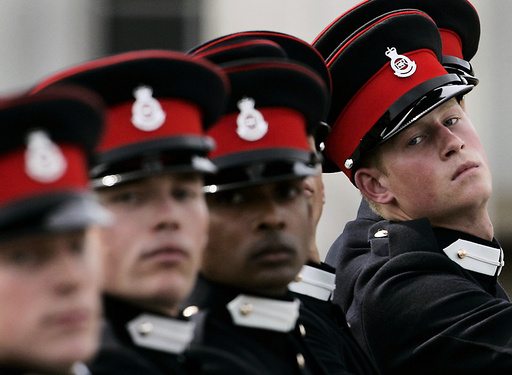 Britain's Prince Harry marches during a parade at the Royal Military Academy Sandhurst in England.