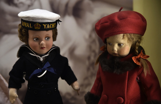 Two dolls belonging to Queen Elizabeth from her childhood are displayed at Buckingham Palace in central London