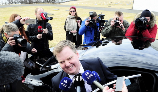 Iceland's Prime Minister Gunnlaugsson speaks to media outside Iceland president's residence in Reykjavik