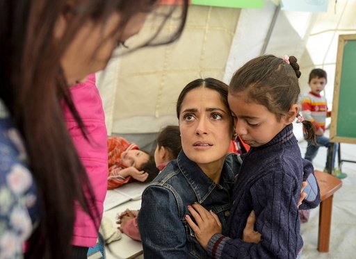 Movie star Salma Hayek meets with Syrian refugees during her visit with UNICEF to an informal settlement in the Bekaa valley