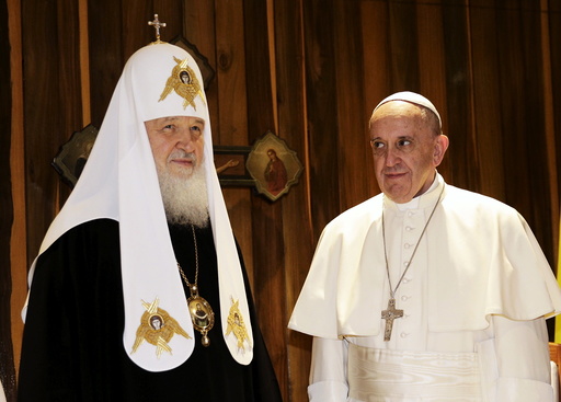 Pope Francis looks at Russian Orthodox Patriarch Kirill during their meeting in Havana