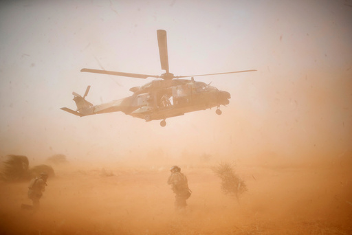 A NH 90 Caiman military helicopter takes-off during the regional anti-insurgent Operation Barkhane in Inaloglog
