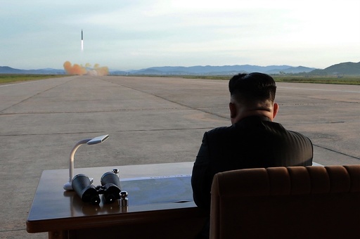 Kim Jong Un attends launching of ballistic missile Hwasong-12