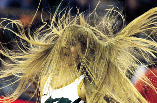 A cheerleader performs during a Euroleague basketball match in group A in Ljubljana