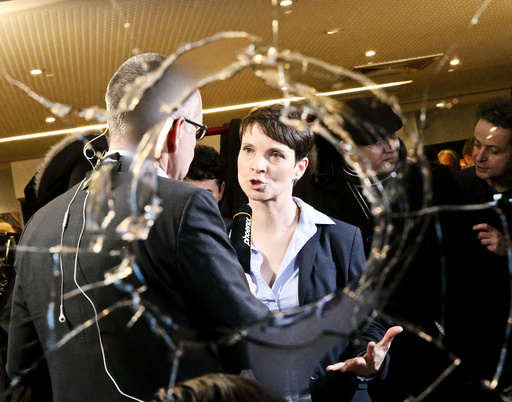 Petry, chairwoman of the anti-immigration party Alternative for Germany reacts after first exit polls in three regional state elections at the AfD party's election night party in Berlin