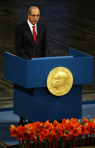 Uzumcu, director general of the OPCW delivers a speech during the Nobel Peace Prize awards ceremony at the City Hall in Oslo