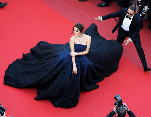 Model Carolina Parsons poses on the red carpet as she arrives for the screening of the film Julieta in competition at the 69th Cannes Film Festival in Cannes