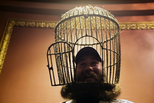 Eric Brooks from Fort Collins, Colorado, with the Traveler Beer Company, poses for a photograph at the 2015 Just For Men National Beard & Moustache Championships at the Kings Theater in the Brooklyn borough of New York