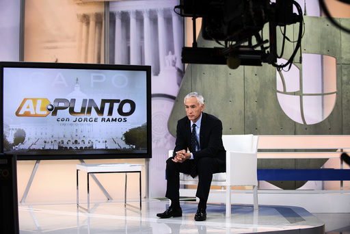Jorge Ramos, star anchor of the Spanish-language network Univision, reports the news on Univision's 