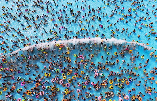 People cool off at a water park in Nanjing