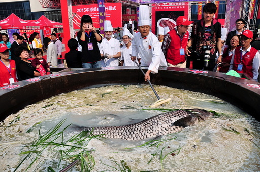 Fish weighing over 80 kilogram is cooked in a hotpot during a food festival in Zhengzhou