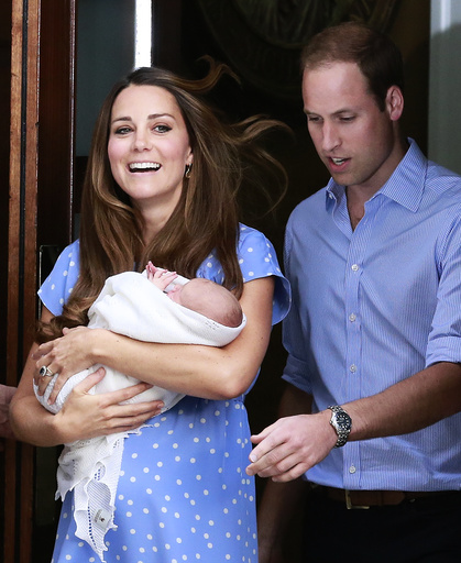 Britain's Prince William and his wife Catherine, Duchess of Cambridge appear with their baby son outside the Lindo Wing of St Mary's Hospital, in central London