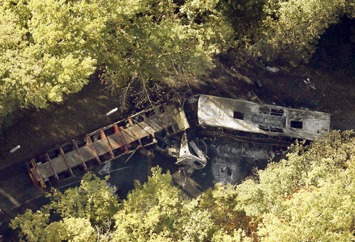 An aerial view of the site where a coach carrying members of an elderly people's club collided with a truck outside Puisseguin