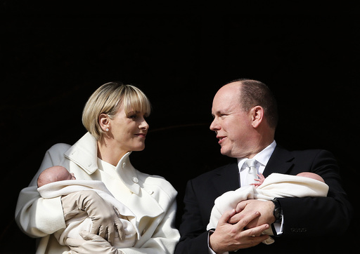 Prince Albert II of Monaco and his wife Princess Charlene hold their twins Prince Jacques and Princess Gabriella as they stand at the Palace Balcony during the official presentation of the Monaco's newborn royals in Monaco