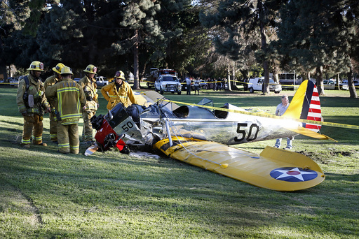 An airplane sits on the ground after crash landing at Penmar Golf Course in Venice, Los Angeles CA
