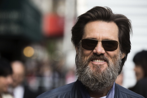 Comedian Jim Carrey arrives at the Ed Sullivan Theater in Manhattan to take part in the taping of tonight's final edition of 