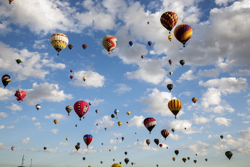 Hot air balloons lift off on the first day of the 2015 Albuquerque International Balloon Fiesta in Albuquerque, New Mexico