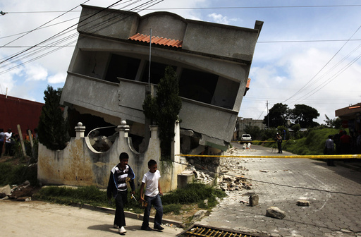 An earthquake-damaged house is pictured in the San Marcos region, in the northwest of Guatemala