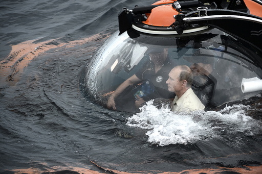 Russian President Vladimir Putin is seen inside a research bathyscaphe while submerging into the waters of the Black Sea near Sevastopol