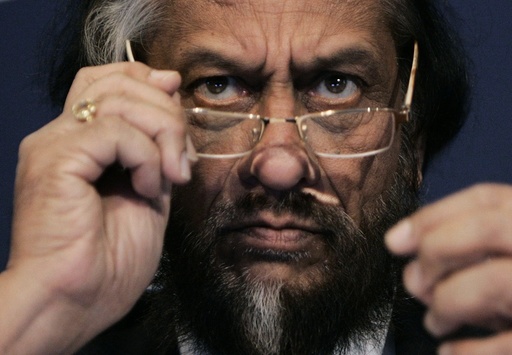 Nobel Peace Prize Winner Pachauri attends a session of the World Economic Forum in Davos